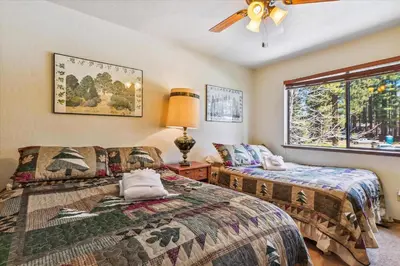 a bedroom with two beds and a window at Minutes From Heavenly Valley & Lake Tahoe Beaches in South Lake Tahoe