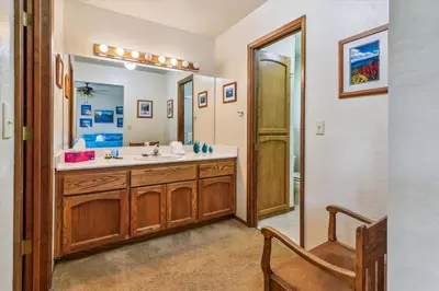a bathroom with a sink and a mirror at Minutes From Heavenly Valley & Lake Tahoe Beaches in South Lake Tahoe