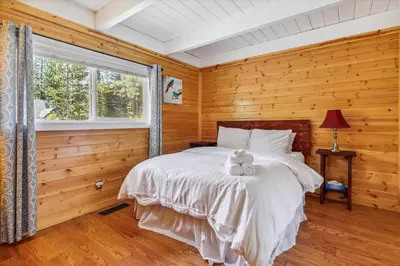 a bedroom with a bed with a teddy bear on it at Newly Renovated, Foosball Table in South Lake Tahoe