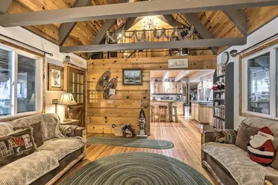 a living room with wooden walls and a ceiling at 8 Mi to Heavenly Mtn Resort! Hot Tub Hideaway in South Lake Tahoe