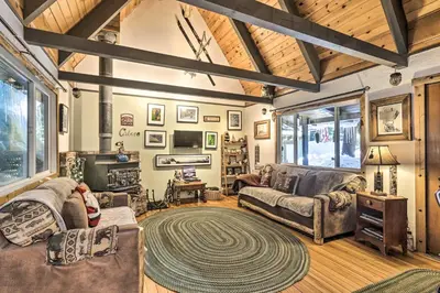 a living room with couches and a rug at 8 Mi to Heavenly Mtn Resort! Hot Tub Hideaway in South Lake Tahoe