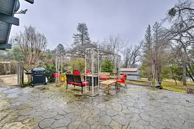 a patio with a table and chairs and a gazebo at North Fork Vacation Rental 28 Mi to Yosemite in North Fork