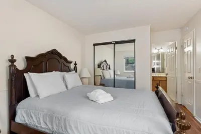 a bedroom with a bed with a white towel on it at Heavenly Chairview Condo home in Stateline