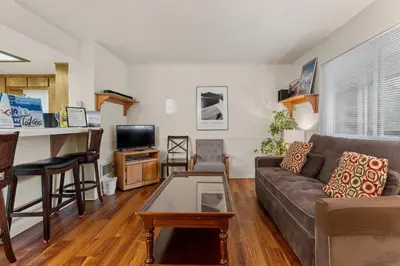 a living room with a couch and a table at Heavenly Chairview Condo home in Stateline