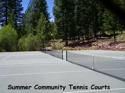 a tennis court with two tennis courts at Spiral Staircase home in Kings Beach