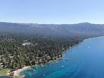 a hot air balloon flying over a body of water at Tall Pines Retreat condo in Incline Village