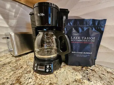 a black coffee maker sitting on a counter next to a bag at Cartwright Corner Condo townhouse in Incline Village