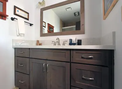 a bathroom with a sink and a mirror at Lakescape condo in Stateline