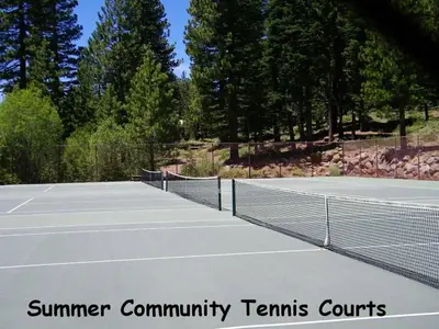 a tennis court with two tennis courts at Kingswood Cornerview home in Kings Beach