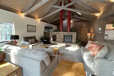 a living room with couches and a fireplace at Tumbleweed Pines home in Incline Village
