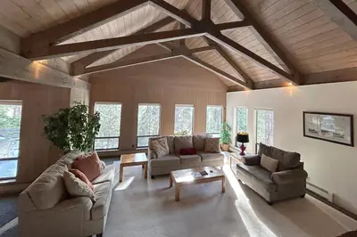 a living room with two couches and a table at Tumbleweed Pines home in Incline Village