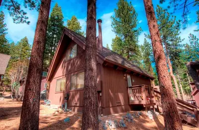 a house in the woods with trees at Cozy Mountain Hideaway home in Incline Village