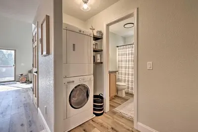 a laundry room with a washer and dryer at Near Hiking and Wineries Arnold Cabin with Deck! in Arnold