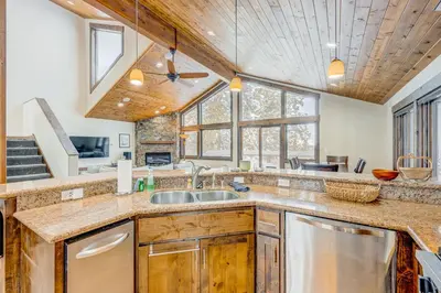 a kitchen with a sink and a counter top at Windsor Lodge in Truckee