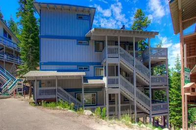 a blue building with balconies on the side of it at Life's Better The Milky Way condo in Stateline