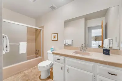 a bathroom with a sink and a toilet and a shower at Three-Bedroom House in South Lake Tahoe