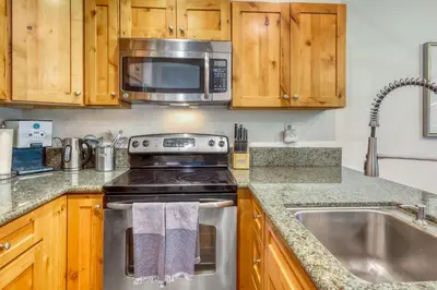 a kitchen with a stove and a sink at Inviting Tahoe Escape in Incline Village