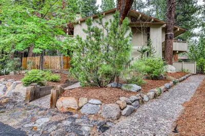 a garden in front of a house at Inviting Tahoe Escape in Incline Village