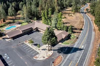 an overhead view of a building with a parking lot at Amador Hotel in Pioneer