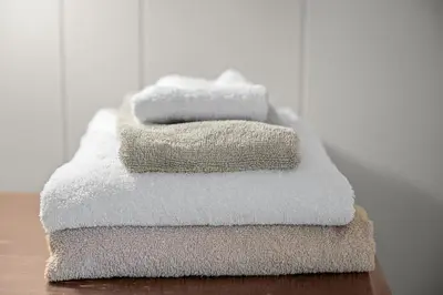 a stack of towels sitting on top of a table at Cozy Cabin home in South Lake Tahoe