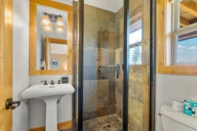 a bathroom with a sink and a shower at Shaquinaw! home in South Lake Tahoe