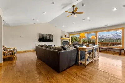 a living room with a couch and a ceiling fan at Shaquinaw! home in South Lake Tahoe