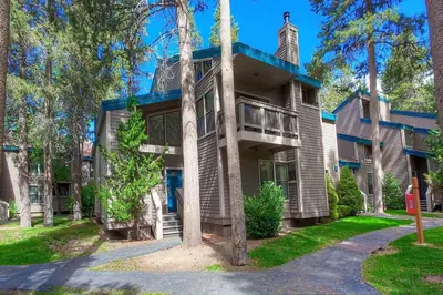a large house with a gambrel roof at Bear Lake Hideaway condo in South Lake Tahoe