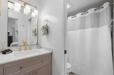 a bathroom with a sink and a shower at Heavenly Lakeside Retreat Close to downtown in South Lake Tahoe
