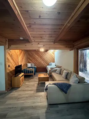a living room with a couch and a table at Blue Lake Chalet- 3 Bedroom + Loft/Pool Table in Arnold/Bear Valley (Pet-Friendly) in Arnold