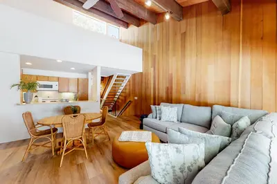 a living room with a couch and a table at Kingswood Village 60 in Kings Beach