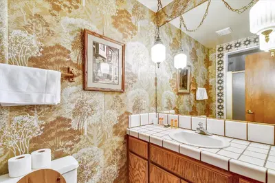 a bathroom with a sink and a mirror at Pet Friendly - Close To Heavenly, Steps To The River in South Lake Tahoe