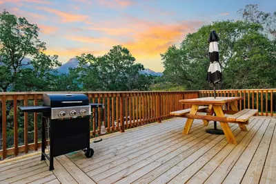a grill and a picnic table on a deck at Casita 3 Rios Secluded Mountain Top Home Minutes to Sequoias & Kings Canyon in Three Rivers