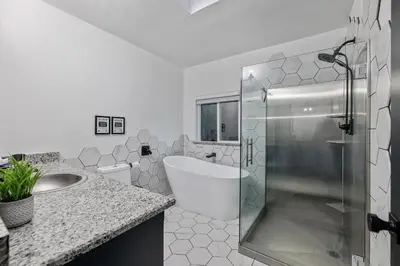 a bathroom with a tub and a sink and a toilet at Casita 3 Rios Secluded Mountain Top Home Minutes to Sequoias & Kings Canyon in Three Rivers