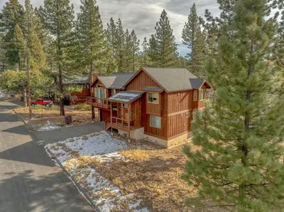 an overhead view of a log cabin in the woods at Sunny Daze Cabin Luxurious 4BDR with Stunning Views in Kings Beach