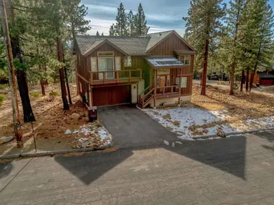 an aerial view of a house in the woods at Sunny Daze Cabin Luxurious 4BDR with Stunning Views in Kings Beach