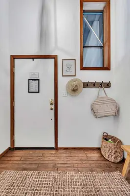 a room with a white door and a mirror at Talmont Pines 4BR Retreat with HOA Beach Access in Tahoe City