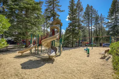 a playground with two slides in a park at Talmont Pines 4BR Retreat with HOA Beach Access in Tahoe City