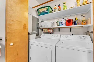 a white washer and dryer in a laundry room at The Big Bear Chalet Private Hot Tub in Carnelian Bay