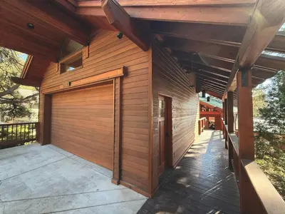 a wooden house with a wooden garage door at Lakeview Hideaway in Kings Beach