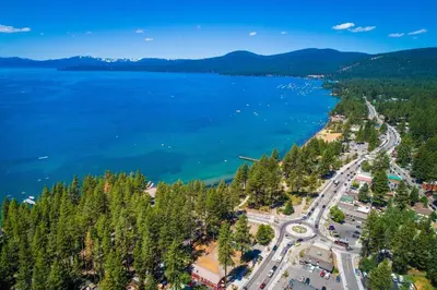 an aerial view of the shore of a lake at Private Ski, Lake & Golf Chalet! Walk to Lake in Tahoe Vista
