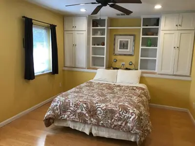 a bedroom with a bed and a ceiling fan at Black Oak Hill Vista near Yosemite - mountain views & starry night sky in Mariposa