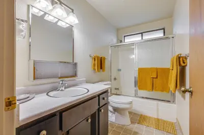 a bathroom with a sink and a toilet at Serene Groveland Cabin Rental Near Yosemite! in Groveland