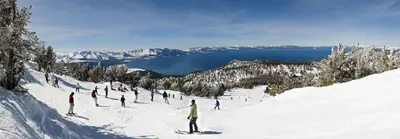 a group of people skiing down a snow covered slope at Rustic and Modern 3BDR Tahoe Cabin in Tahoe City