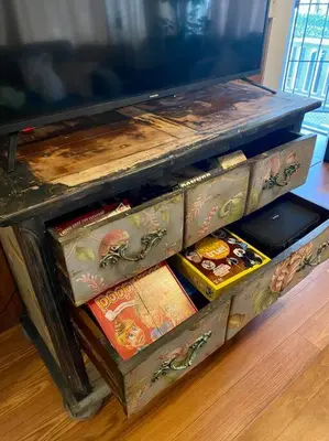 an old table with drawers filled with books at Spacious Downtown Jackson Retreat- Historic Hangout in Jackson